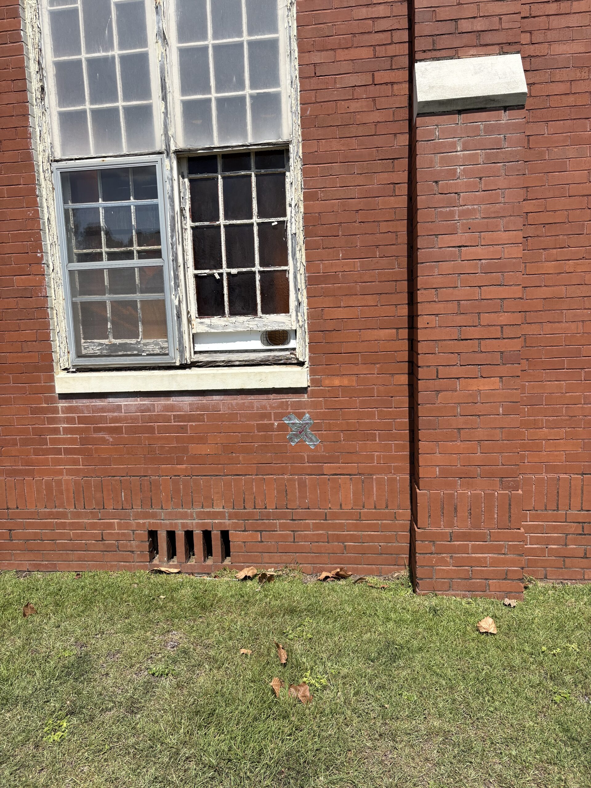 Marking where a/c units going / deteriorated windows