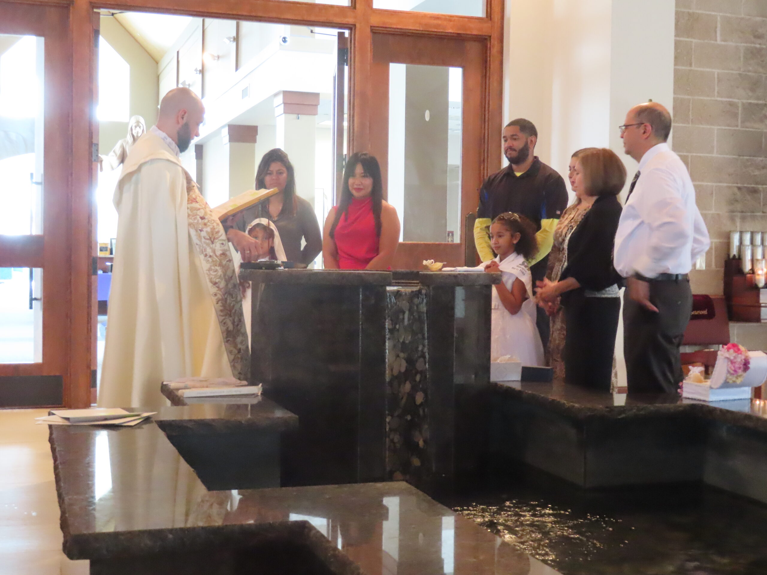 Fr Ziemowitz during the Baptism ceremony