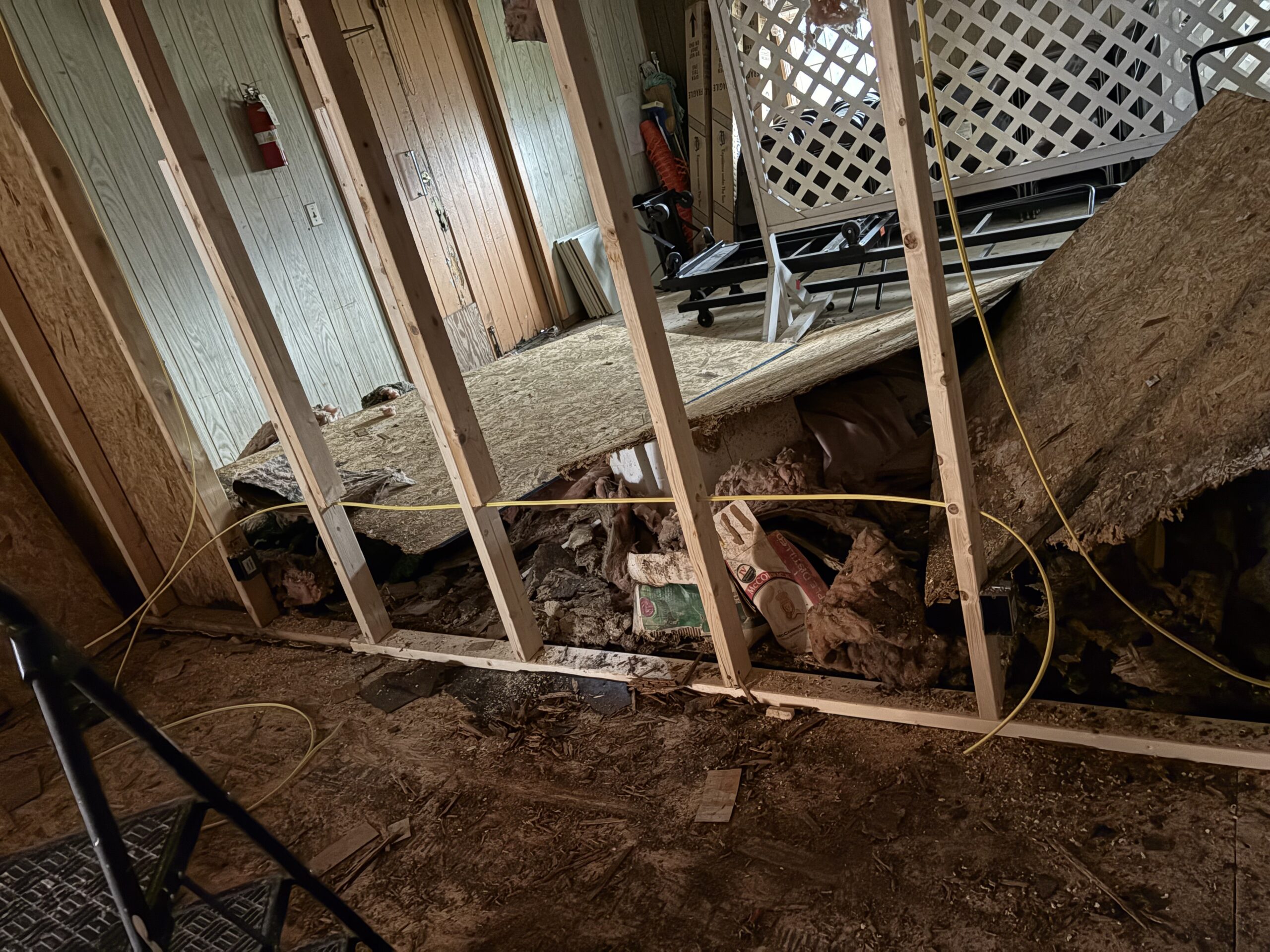 removing the wall for the electricians