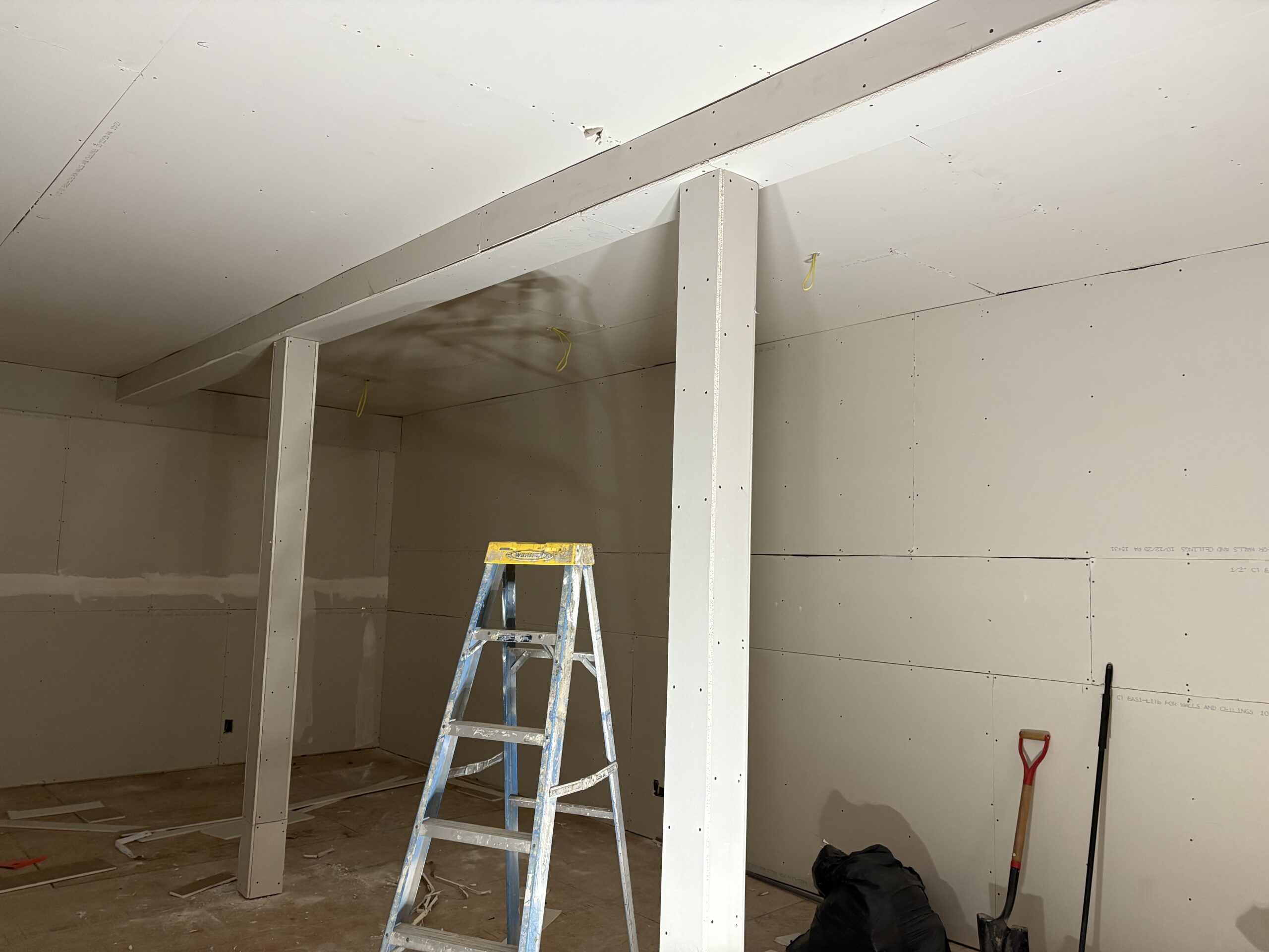North wing sheetrocked and new subfloor installed