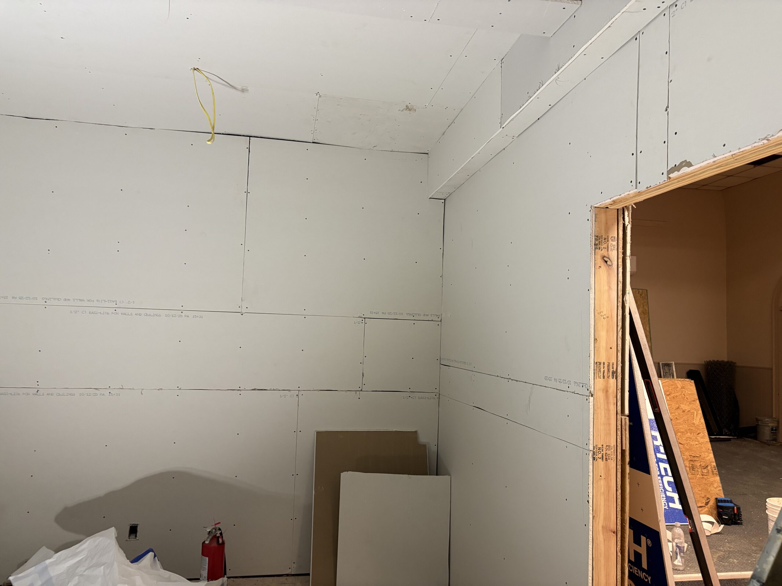north wing with door framed and sheetrock installed